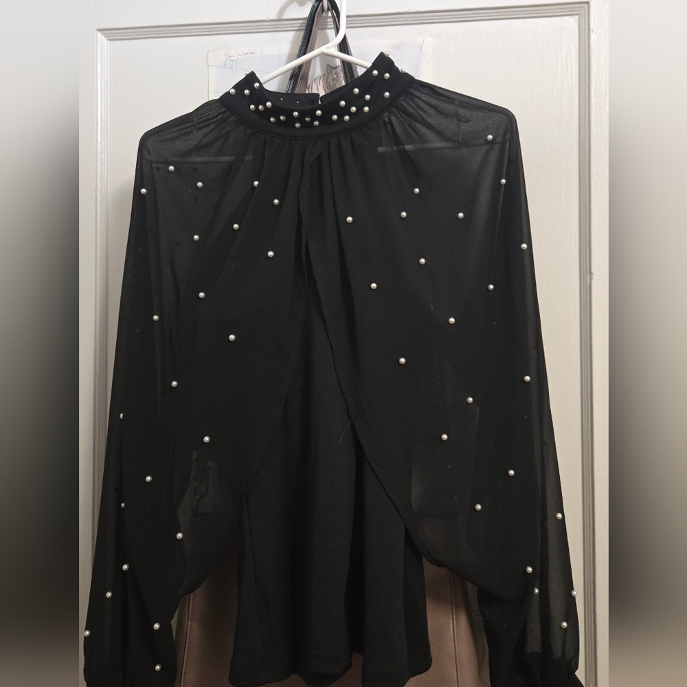 Black Turtleneck With Pearls